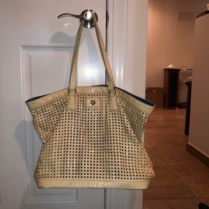 JPK cream purse with mini blue pocket purse within